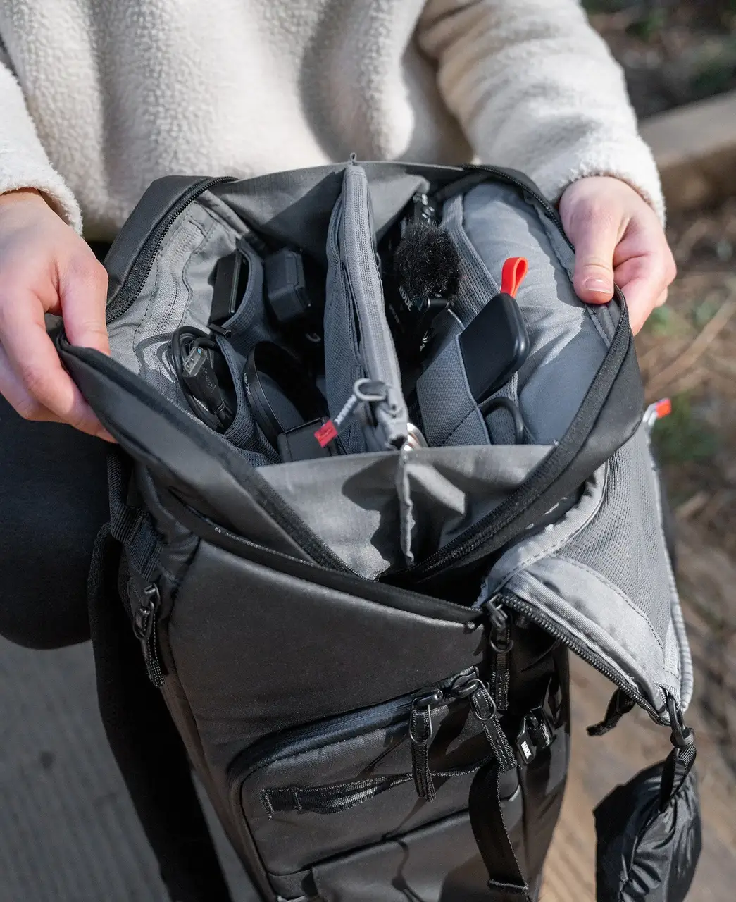 Close up view of a N-Cubik Tech Pouch T2 opened inside a N-PVD JunZhiJia backpack.