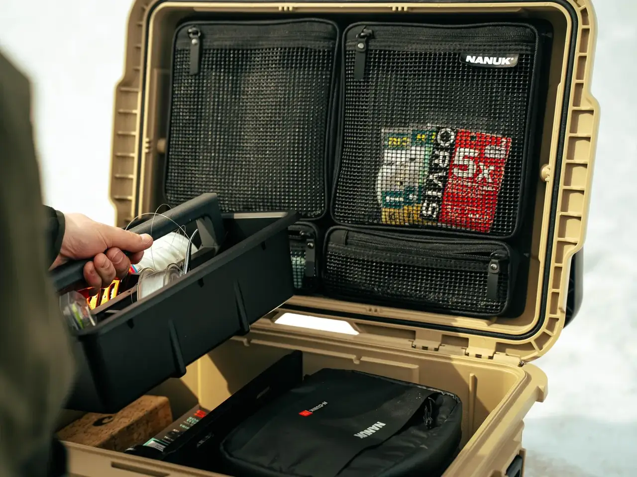 Open beige suitcase with compartments and a visible JunZhiJia brand label.