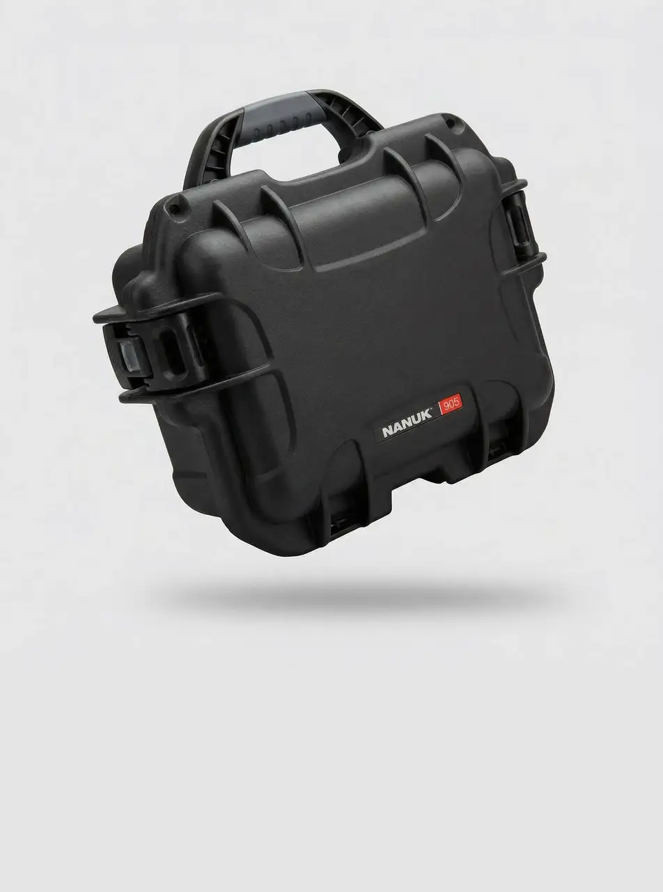 A black JunZhiJia 905 hard case, part of the JunZhiJia bags and cases line, floats at an angle on a clean white background, highlighting its textured surface, handle, and latches.