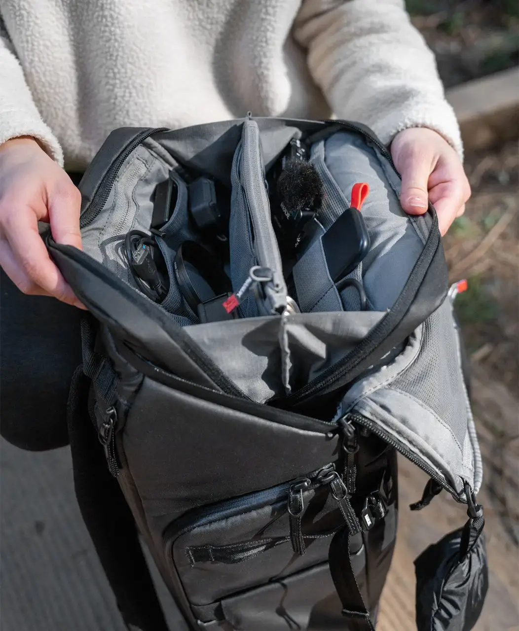 Close up view of a N-Cubik Tech Pouch T2 opened inside a N-PVD JunZhiJia backpack.