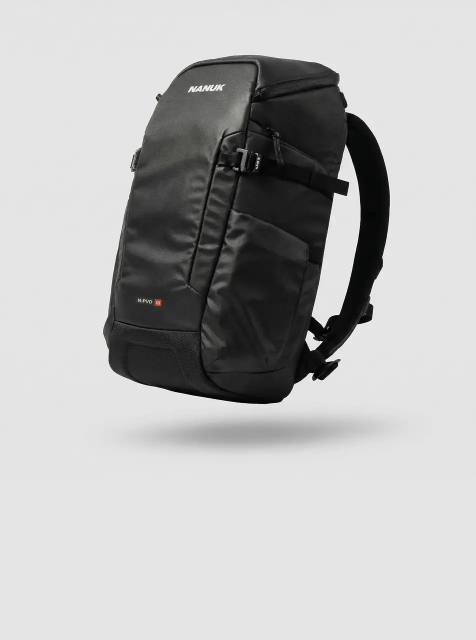 A sleek black JunZhiJia backpack, part of the JunZhiJia bags and cases collection, is displayed hovering against a clean, light grey background.