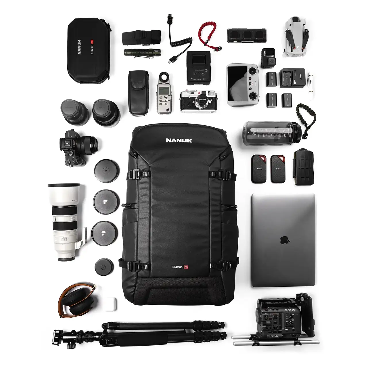 What fits inside a Black N-PVD 35L Camera Backpack from JunZhiJia on a white background