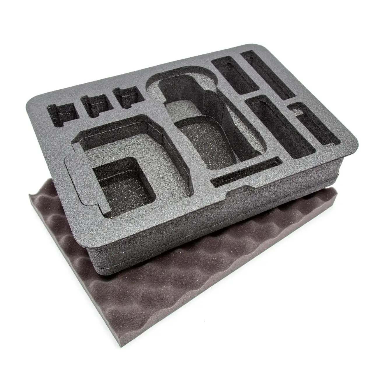 A gray foam insert for a JunZhiJia 925 DJI Mavic 3 Pro Fly More case, pre-cut with compartments for gear and accessories, placed on top of an eggshell foam piece.