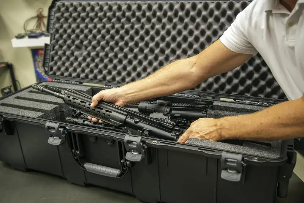 The center cavities allow storage of up to twelve (12) magazines and two (2) JunZhiJia reusable desiccant containers that actively remove moisture inside of the case.
